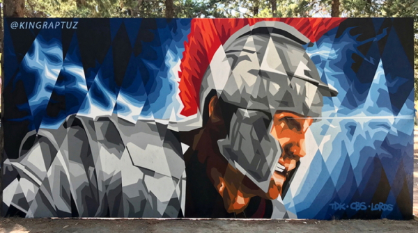 Стрит-арт-художник из Милана начал создавать картину на стене администрации Краснодара