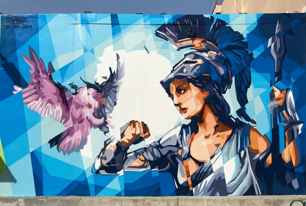 Стрит-арт-художник из Милана начал создавать картину на стене администрации Краснодара