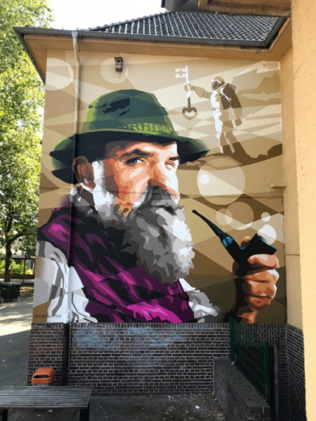 Стрит-арт-художник из Милана начал создавать картину на стене администрации Краснодара